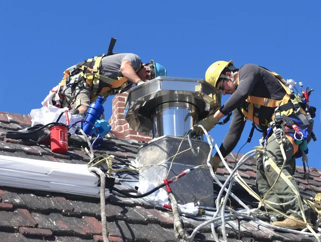 Protective chimney cap installed by Colchester Chimney Sweep in Colchester, CT