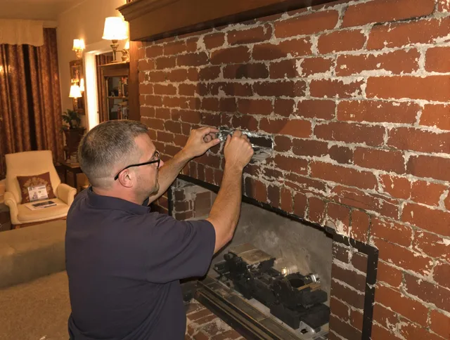 Colchester Chimney Sweep expert fixing a fireplace in Colchester, CT